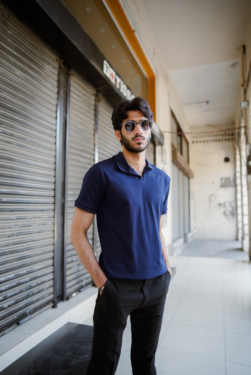 Men’s navy blue drop needle polo shirt – front view
