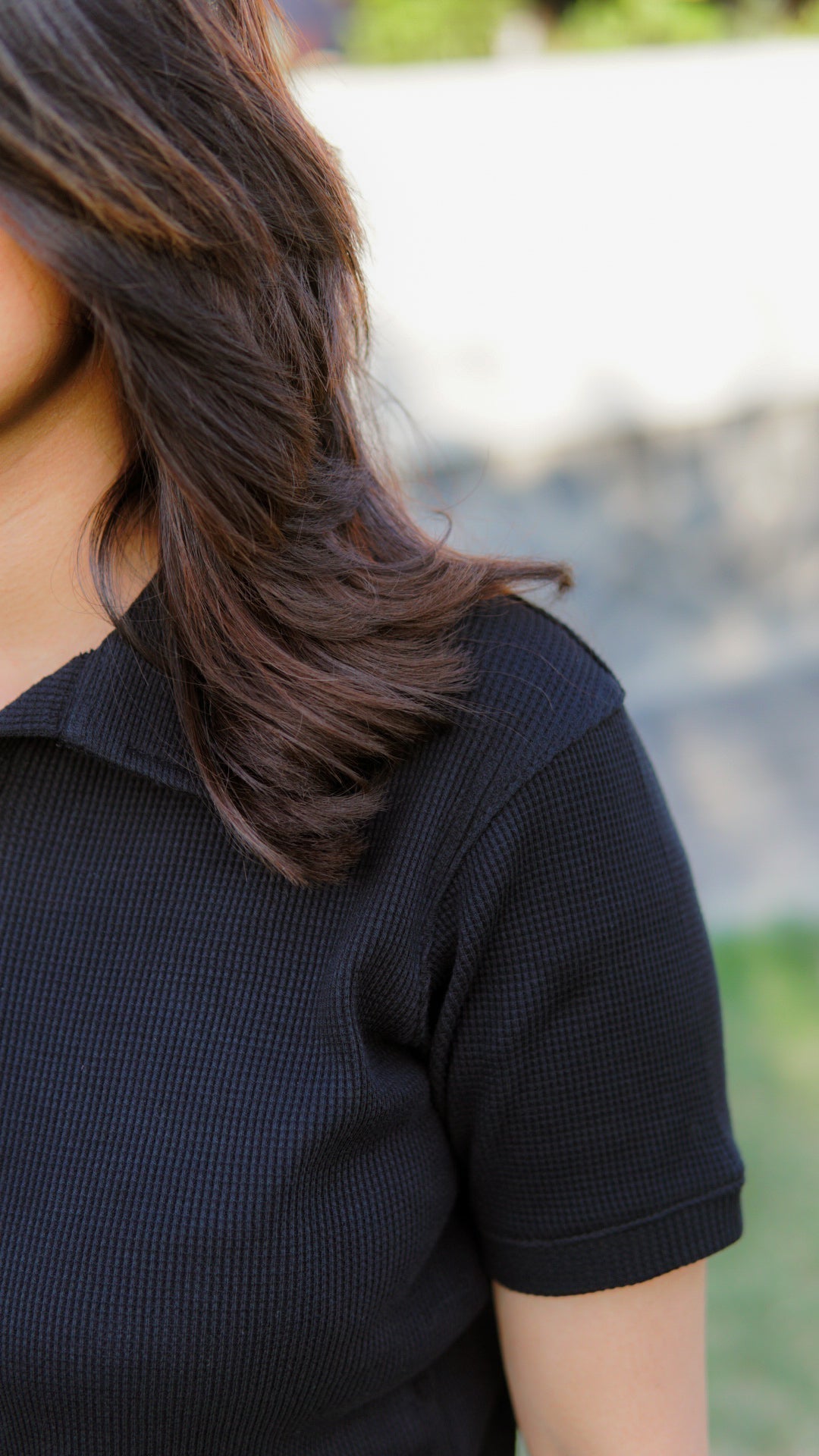 Noir black polo shirt by Pardais – sleeve view