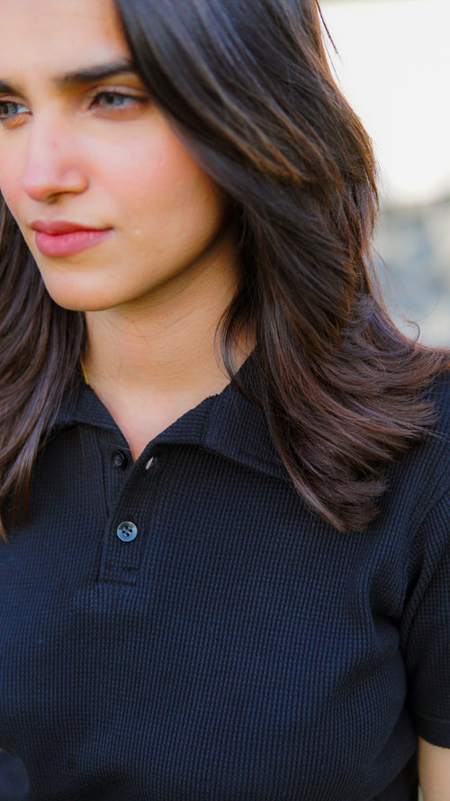 Noir black polo shirt by Pardais – Close up view